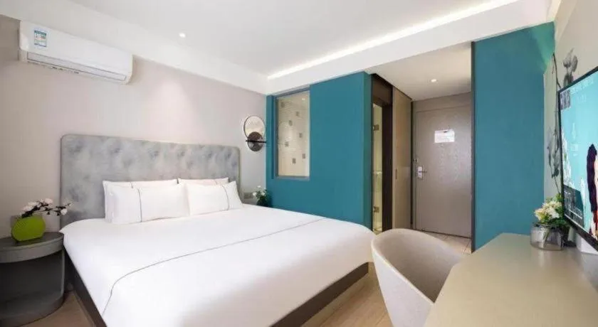 Bed in Magnotel Hotel Dandong Railway Yalv River