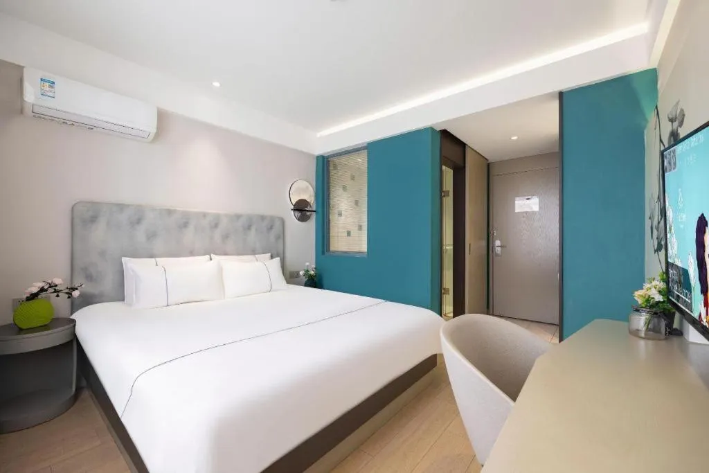 Bed in Magnotel Hotel Dandong Railway Yalv River