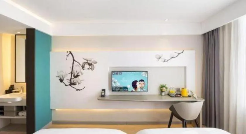 Bed in Magnotel Hotel Dandong Railway Yalv River