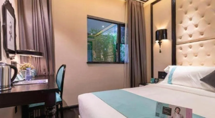 Bed in Xana Hotelle·Guangzhou Shangxiajiu Yongqingfang Changshou Road Metro Station