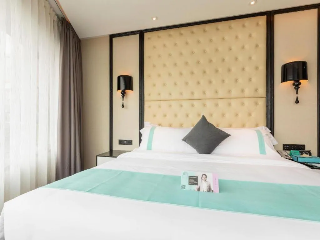 Bed in Xana Hotelle·Guangzhou Shangxiajiu Yongqingfang Changshou Road Metro Station