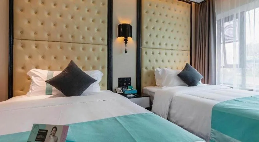 Bed in Xana Hotelle·Guangzhou Shangxiajiu Yongqingfang Changshou Road Metro Station