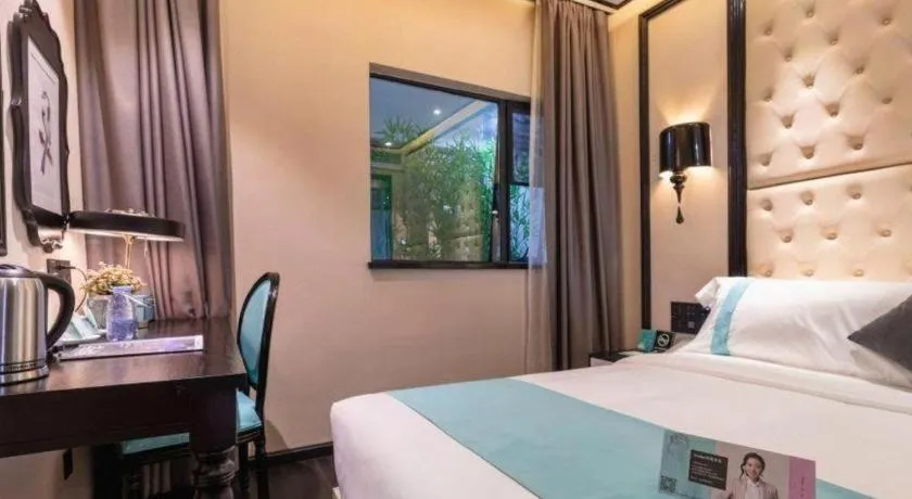 Bed in Xana Hotelle·Guangzhou Shangxiajiu Yongqingfang Changshou Road Metro Station