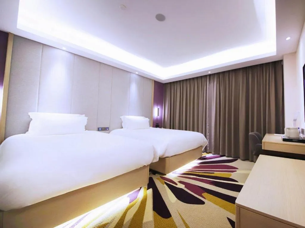 Bed in Lavande Hotel·Heyuan Bavaria