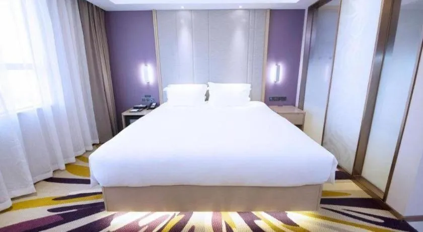 Bed in Lavande Hotel·Heyuan Bavaria