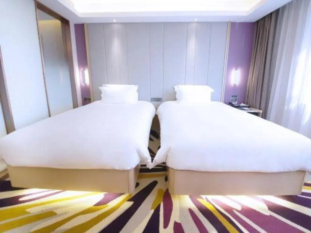 Bed in Lavande Hotel·Heyuan Bavaria