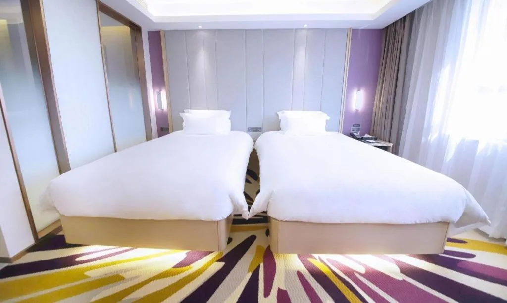 Bed in Lavande Hotel·Heyuan Bavaria