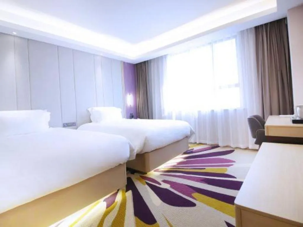 Bed in Lavande Hotel·Heyuan Bavaria