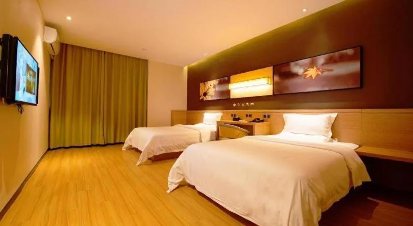 Bed in IU Hotel·Tianjin Binhai New District Yanghuo Market