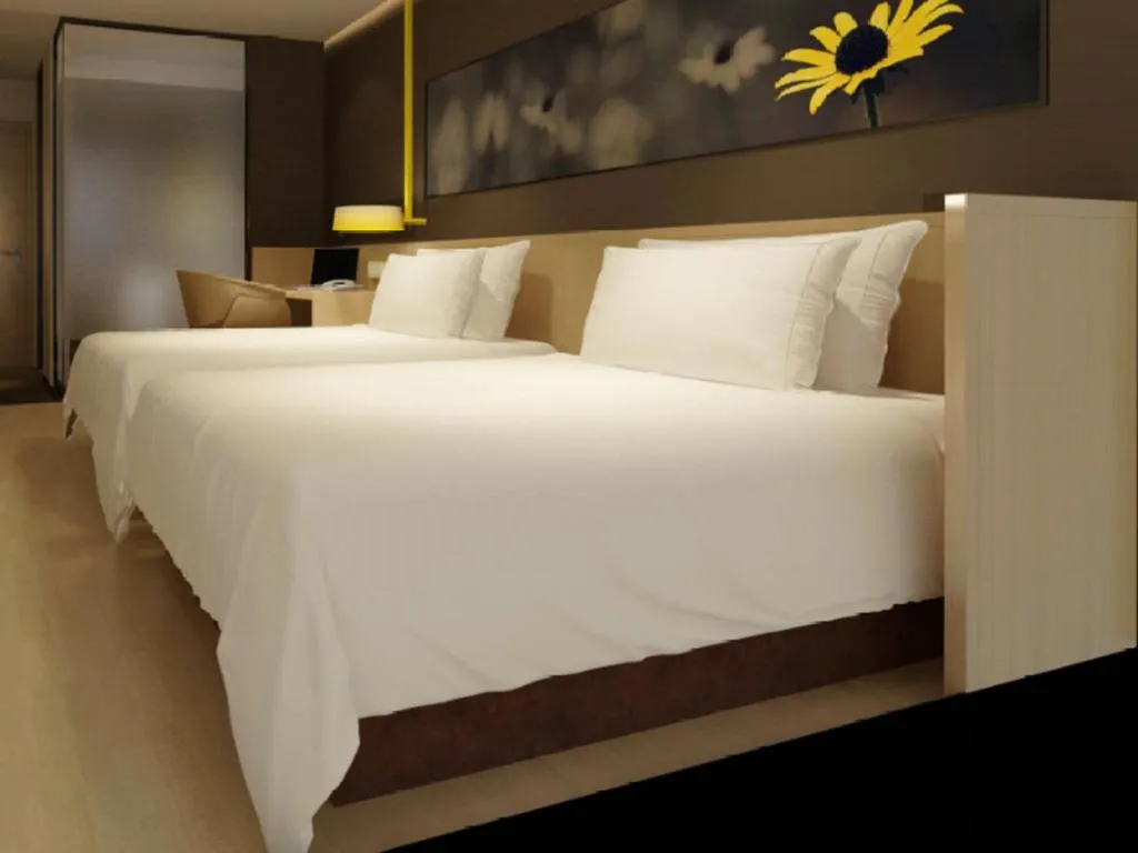 Bed in IU Hotel·Tianjin Binhai New District Yanghuo Market