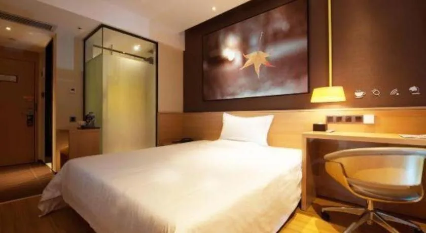 Bed in IU Hotel·Tianjin Binhai New District Yanghuo Market
