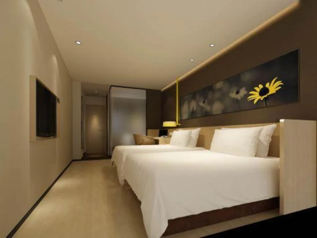 Bed in IU Hotel·Tianjin Binhai New District Yanghuo Market