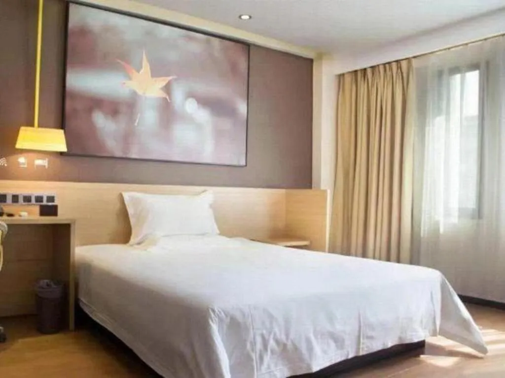 Bed in IU Hotel·Tianjin Binhai New District Yanghuo Market