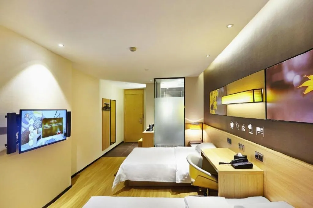Bed in IU Hotel·Tianjin Binhai New District Yanghuo Market