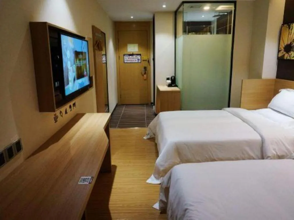 Bed in IU Hotel·Tianjin Binhai New District Yanghuo Market