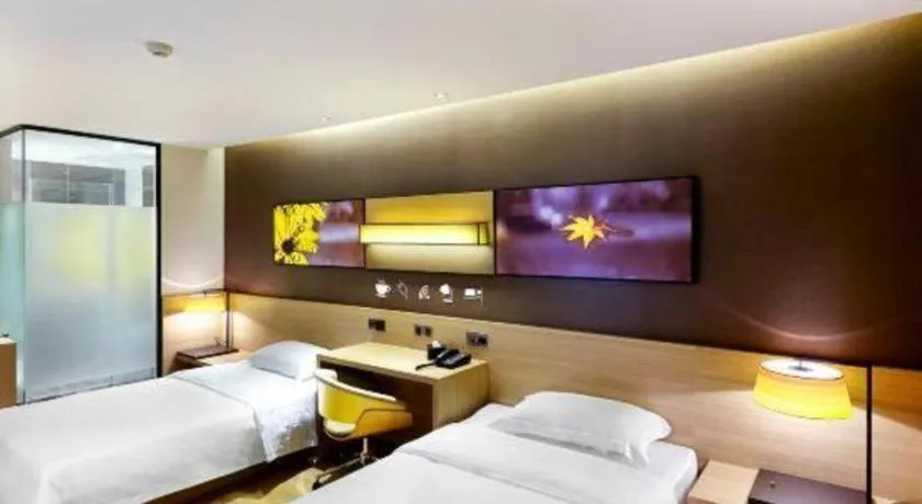 Bed in IU Hotel·Tianjin Binhai New District Yanghuo Market