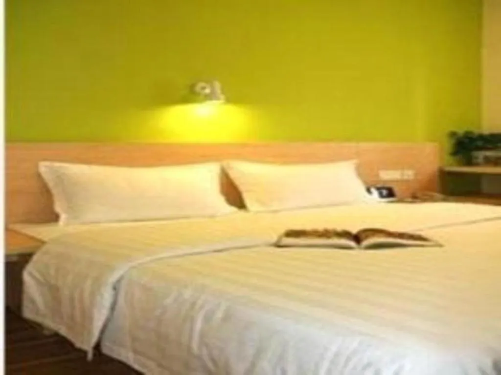 Bed in IU Hotel·Tianjin Binhai New District Yanghuo Market