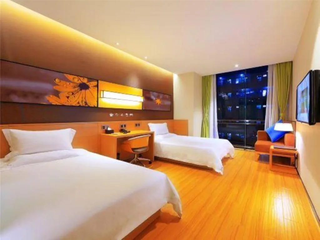 Bed in IU Hotel·Tianjin Binhai New District Yanghuo Market