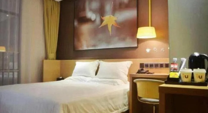 Bed in IU Hotel·Tianjin Binhai New District Yanghuo Market