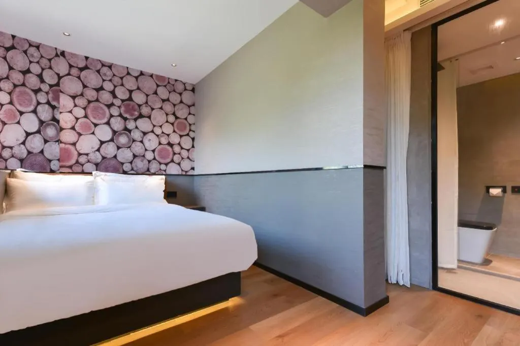 Bed in Zmax Hotel Beijing Wangjing Jiuxianqiao Xingji Bear