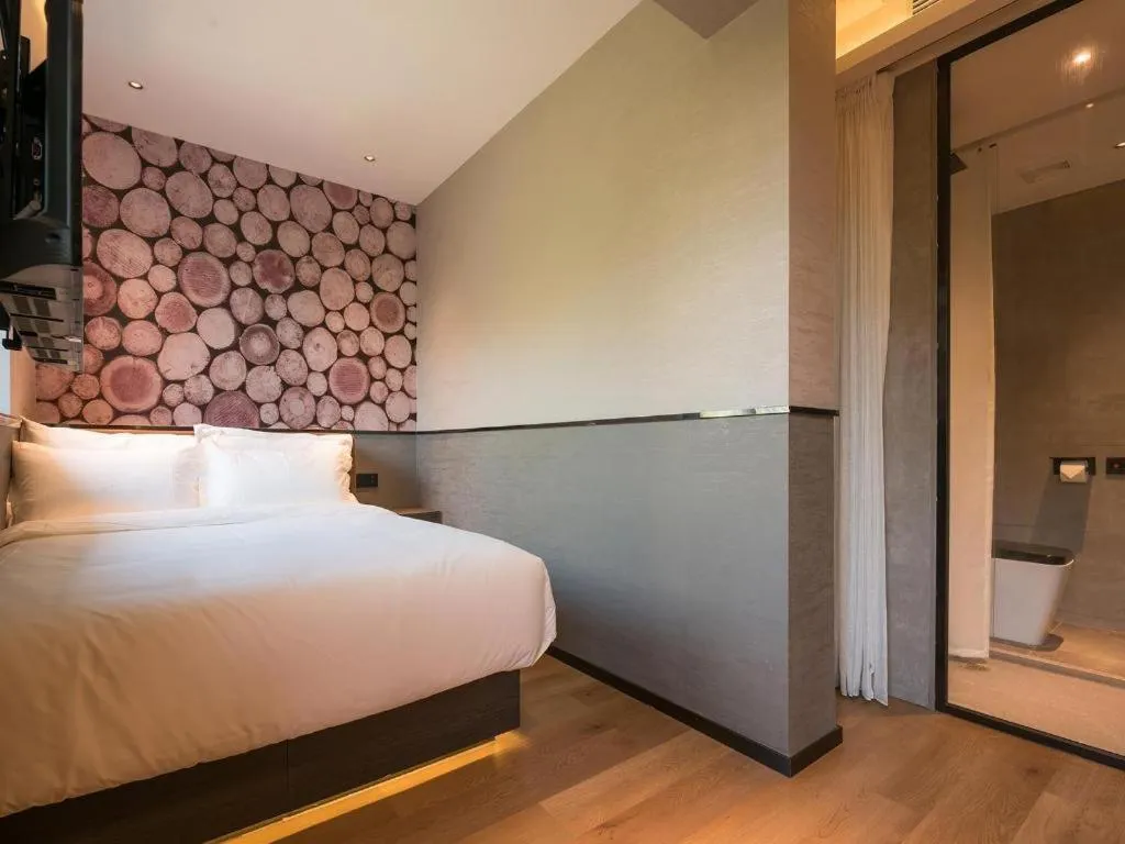 Bed in Zmax Hotel Beijing Wangjing Jiuxianqiao Xingji Bear