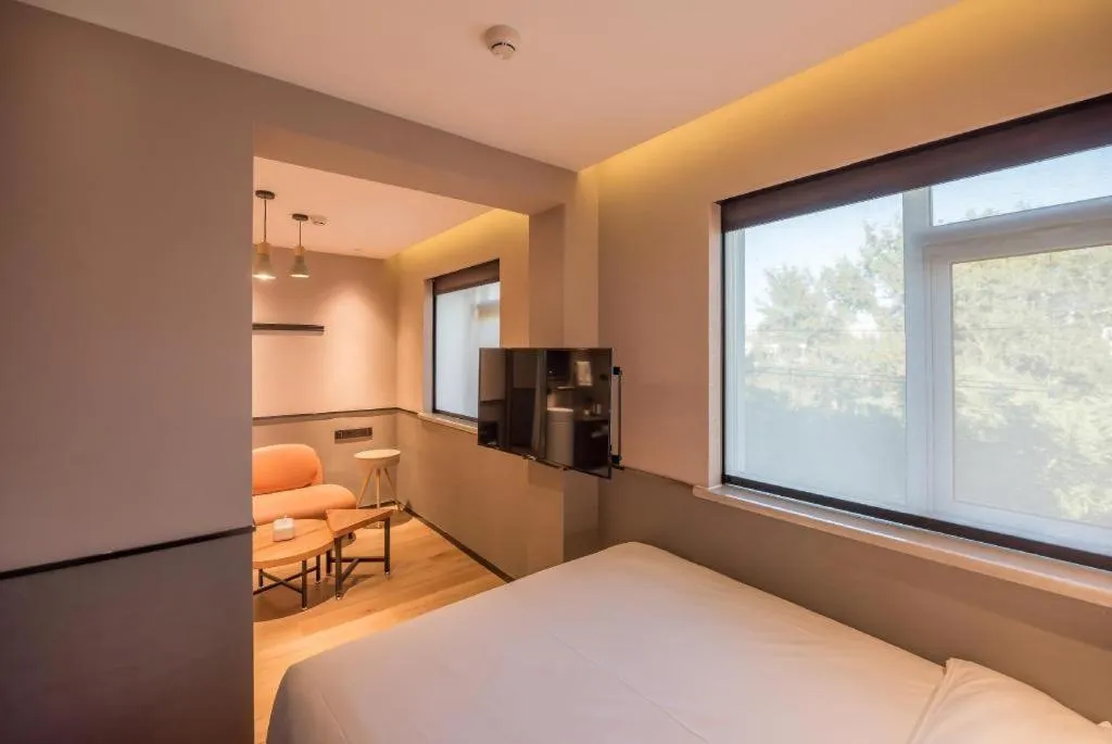 Bed in Zmax Hotel Beijing Wangjing Jiuxianqiao Xingji Bear