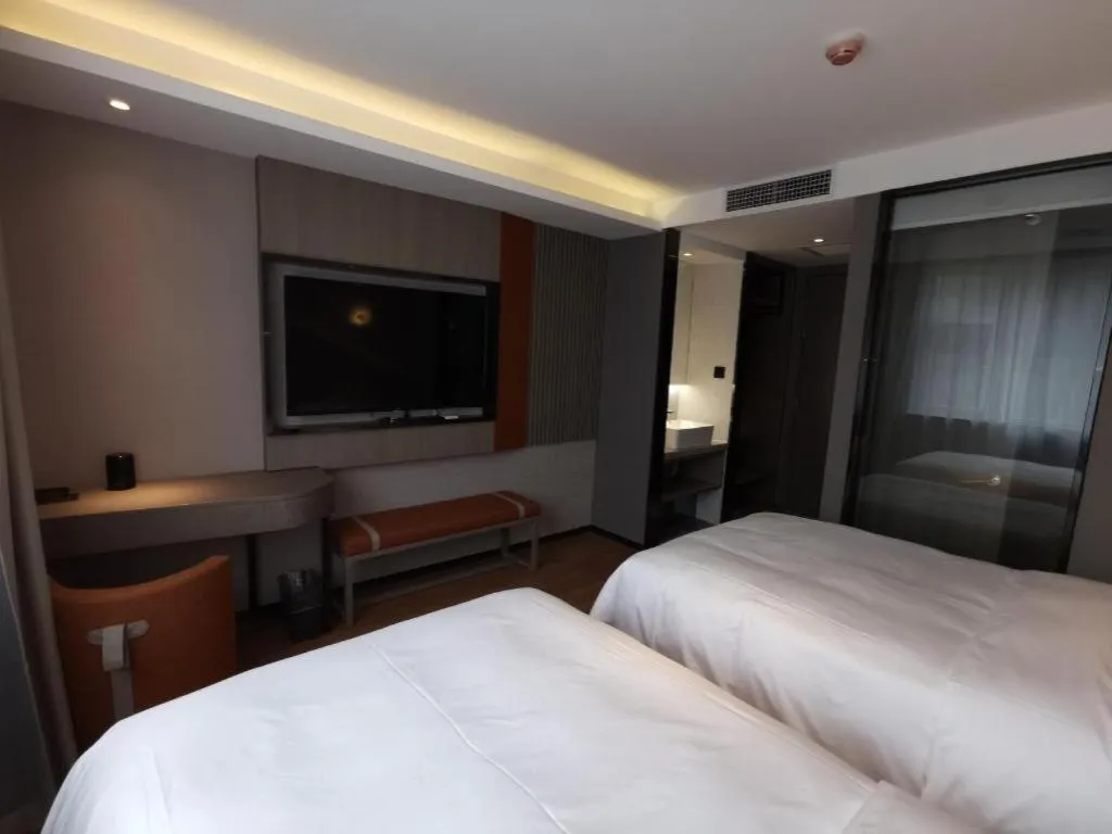 Bed in Zmax Hotel Beijing Wangjing Jiuxianqiao Xingji Bear