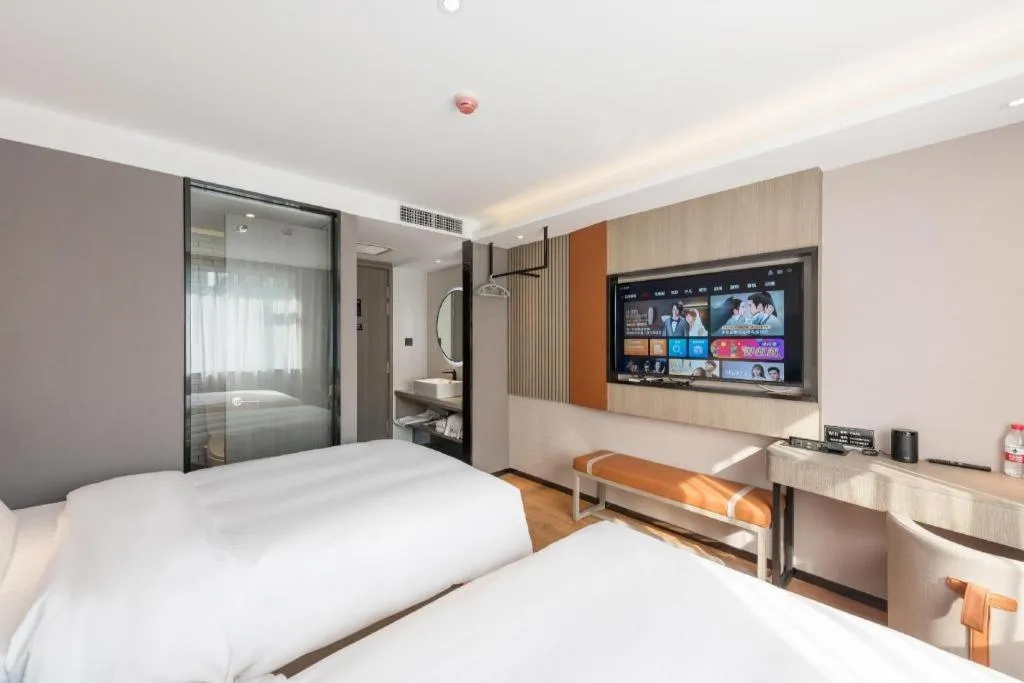 Bed in Zmax Hotel Beijing Wangjing Jiuxianqiao Xingji Bear