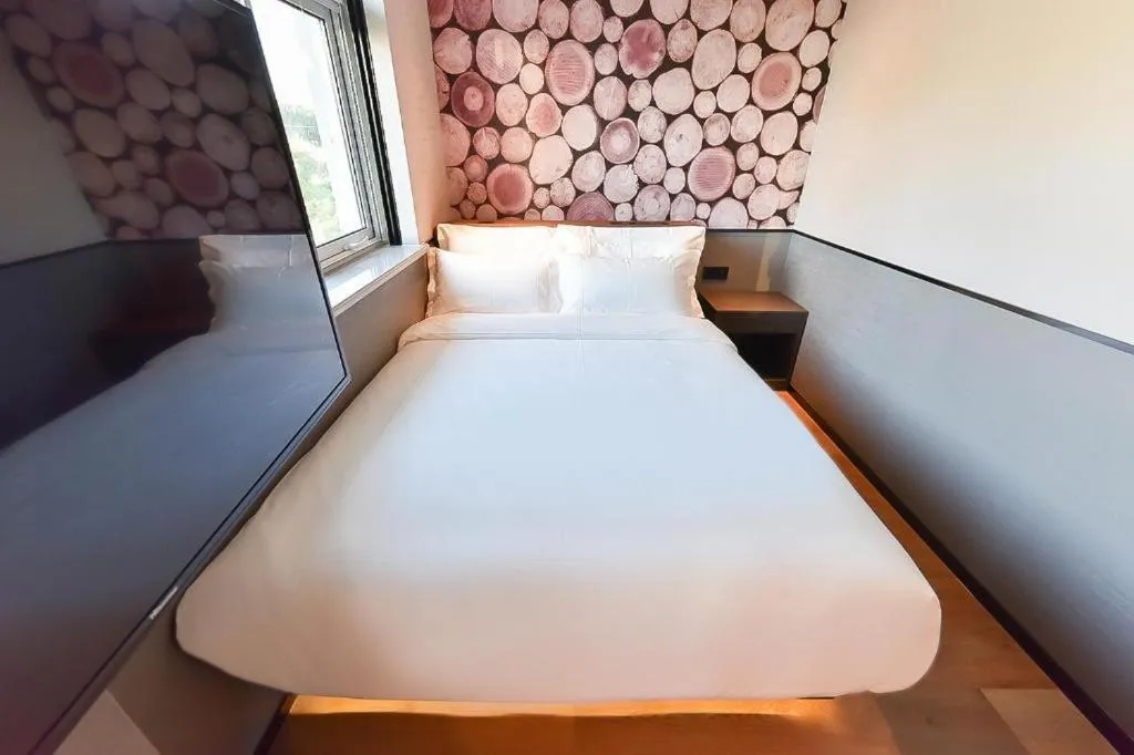 Bed in Zmax Hotel Beijing Wangjing Jiuxianqiao Xingji Bear