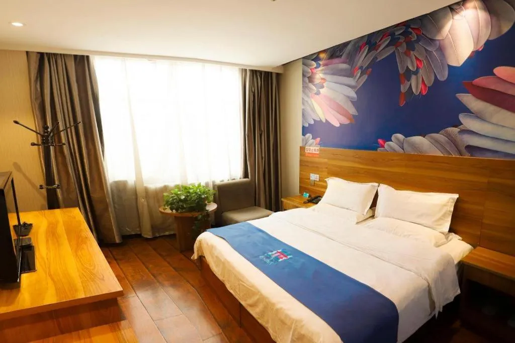 Bed in PAI Hotel Huayin Huashan Mountain Scenic Spot Ancient Street