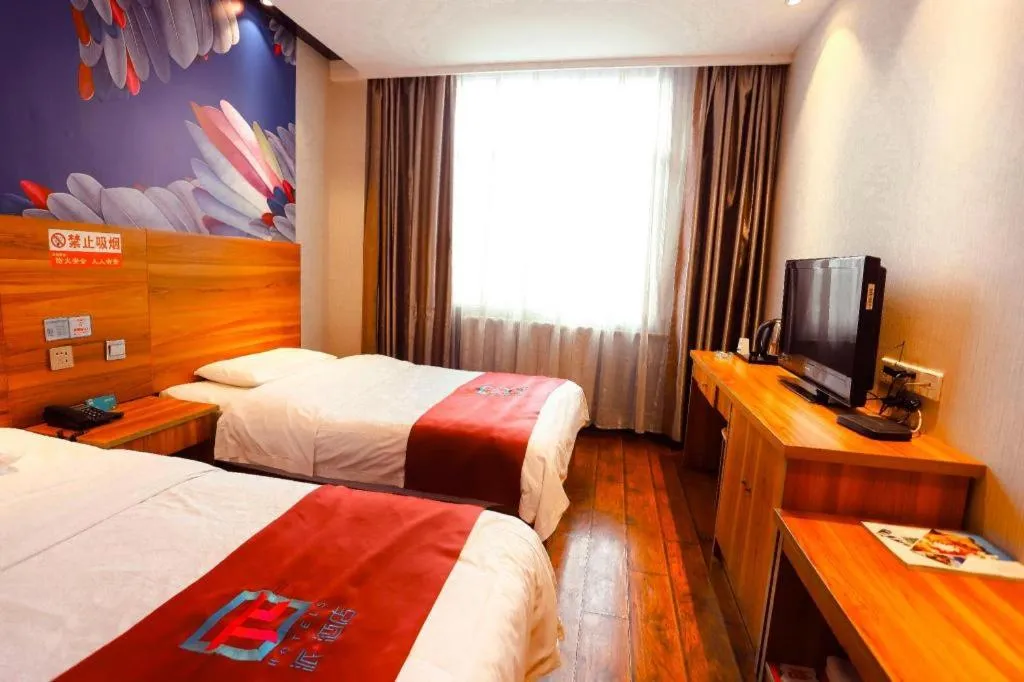 Bed in PAI Hotel Huayin Huashan Mountain Scenic Spot Ancient Street
