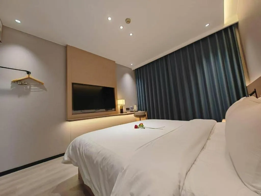 Bed in PAI Hotel Huayin Huashan Mountain Scenic Spot Ancient Street