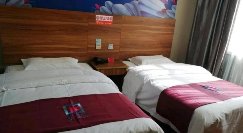 Bed in PAI Hotel Huayin Huashan Mountain Scenic Spot Ancient Street