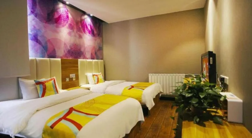Bed in PAI Hotel Huayin Huashan Mountain Scenic Spot Ancient Street