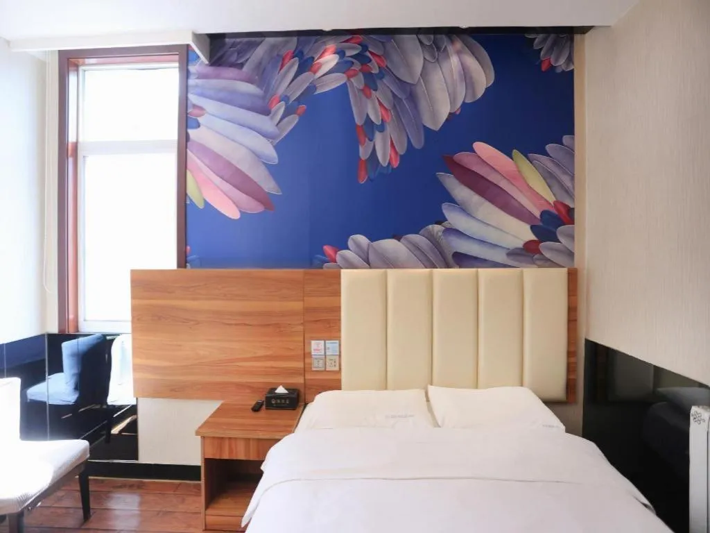 Bed in PAI Hotel Huayin Huashan Mountain Scenic Spot Ancient Street