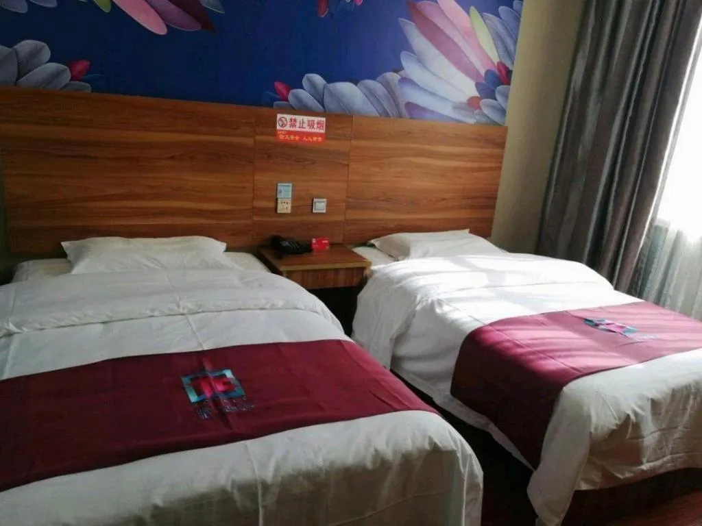 Bed in PAI Hotel Huayin Huashan Mountain Scenic Spot Ancient Street