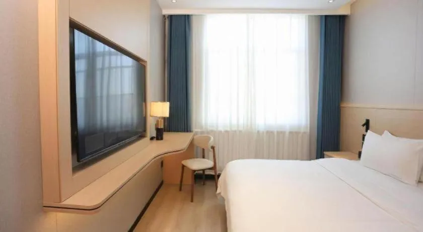 Bed in PAI Hotel Huayin Huashan Mountain Scenic Spot Ancient Street