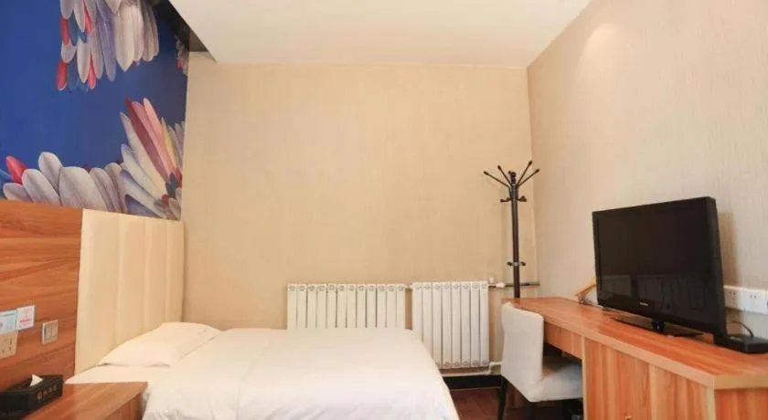 Bed in PAI Hotel Huayin Huashan Mountain Scenic Spot Ancient Street