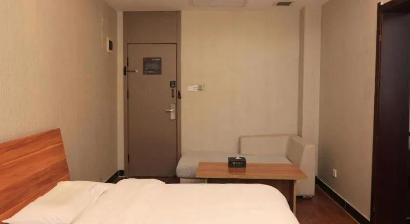 Bed in PAI Hotel Huayin Huashan Mountain Scenic Spot Ancient Street