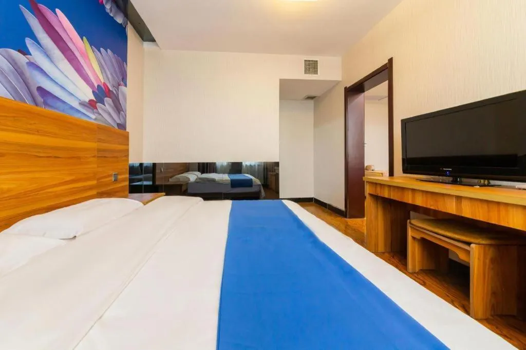 Bed in PAI Hotel Huayin Huashan Mountain Scenic Spot Ancient Street