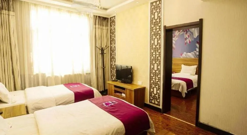 Bed in PAI Hotel Huayin Huashan Mountain Scenic Spot Ancient Street