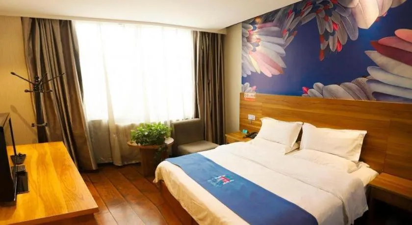 Bed in PAI Hotel Huayin Huashan Mountain Scenic Spot Ancient Street