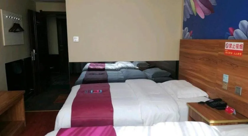 Bed in PAI Hotel Huayin Huashan Mountain Scenic Spot Ancient Street