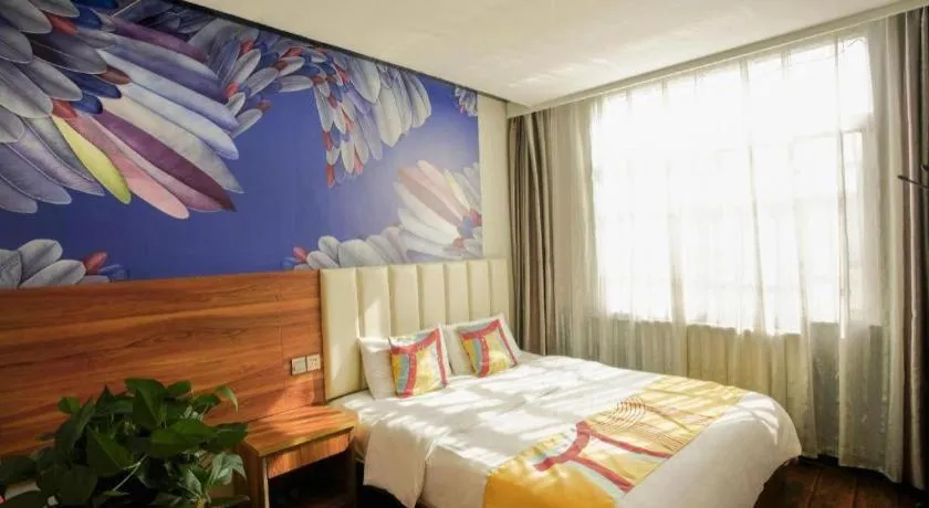 Bed in PAI Hotel Huayin Huashan Mountain Scenic Spot Ancient Street
