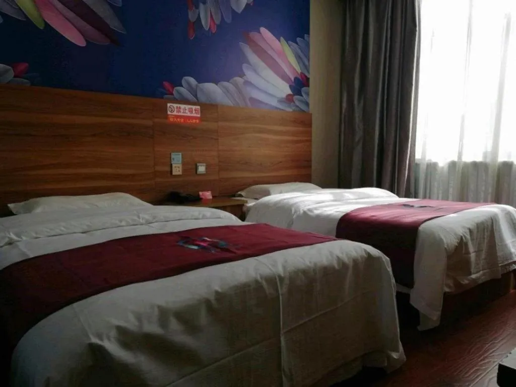 Bed in PAI Hotel Huayin Huashan Mountain Scenic Spot Ancient Street