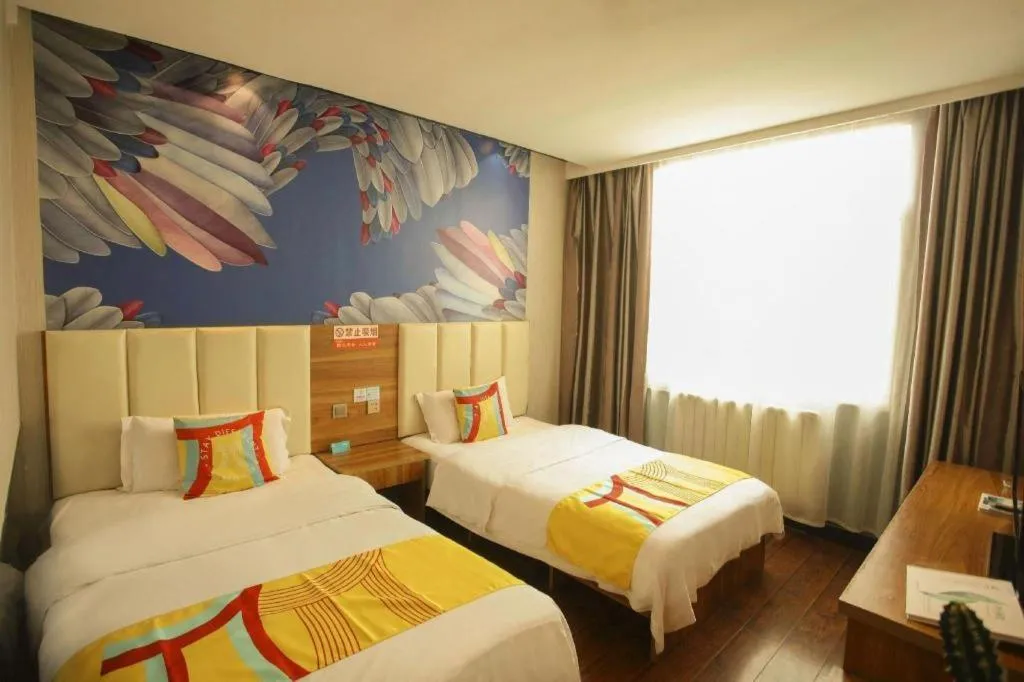 Bed in PAI Hotel Huayin Huashan Mountain Scenic Spot Ancient Street
