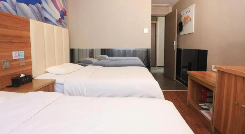 Bed in PAI Hotel Huayin Huashan Mountain Scenic Spot Ancient Street