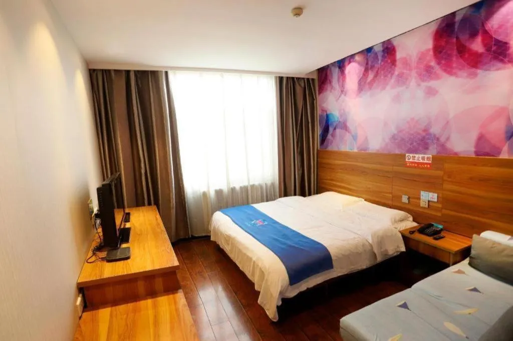 Bed in PAI Hotel Huayin Huashan Mountain Scenic Spot Ancient Street