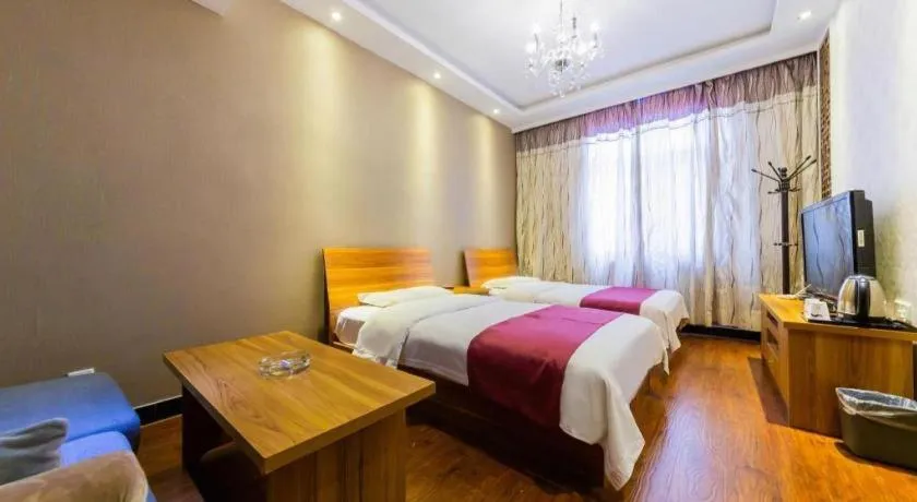 Bed in PAI Hotel Huayin Huashan Mountain Scenic Spot Ancient Street