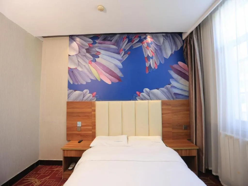 Bed in PAI Hotel Huayin Huashan Mountain Scenic Spot Ancient Street